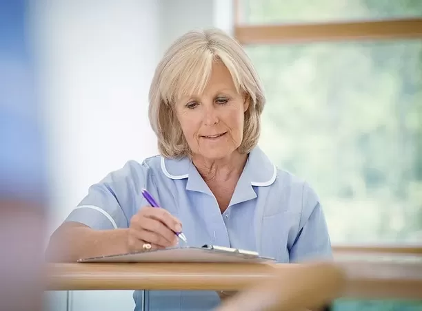 nurse taking notes